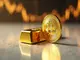 goldman-sachs-sees-gold-outpacing-bitcoin-as-crypto-hits-highs-and-risks-rise